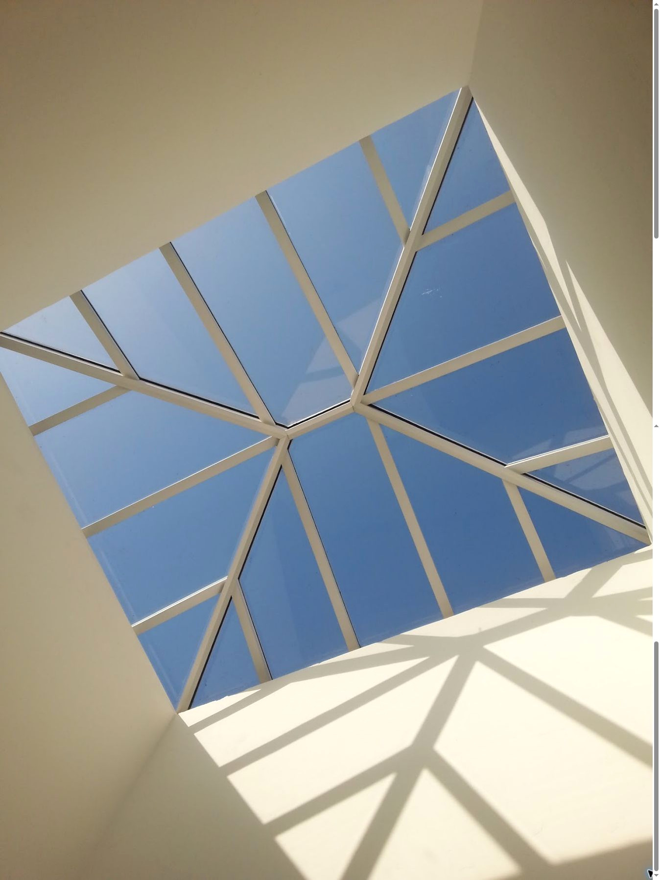 Clean commercial skylight panels viewed from below