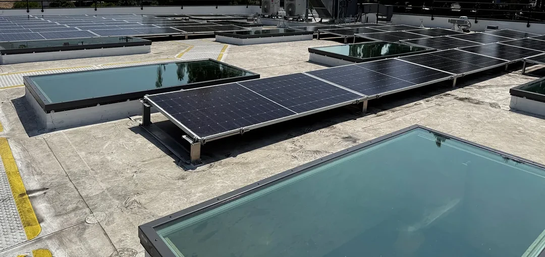 Solar panels and rooftop skylights at a commercial property in Burbank.